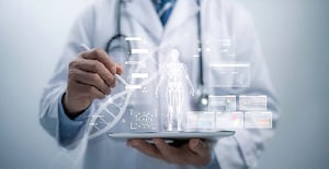 Medical professional interacting with augmented reality healthcare data representing HIPAA-compliant managed cloud solutions