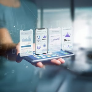 Composite of a phone being held horizontally with screen images projected above it