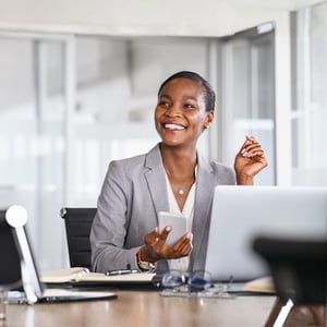 Image of an employee smiling during a meeting