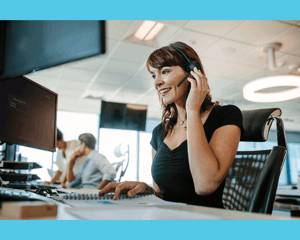 Service Desk agent on a headset helping a customer